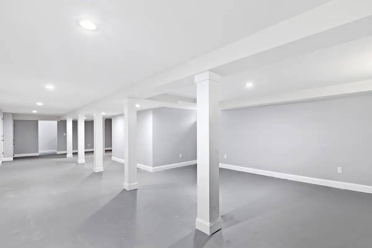 26 Whooping Hollow Road East Hampton, NY 11937 - Photo 15 of 18 an empty room with a cabinet and mirrors