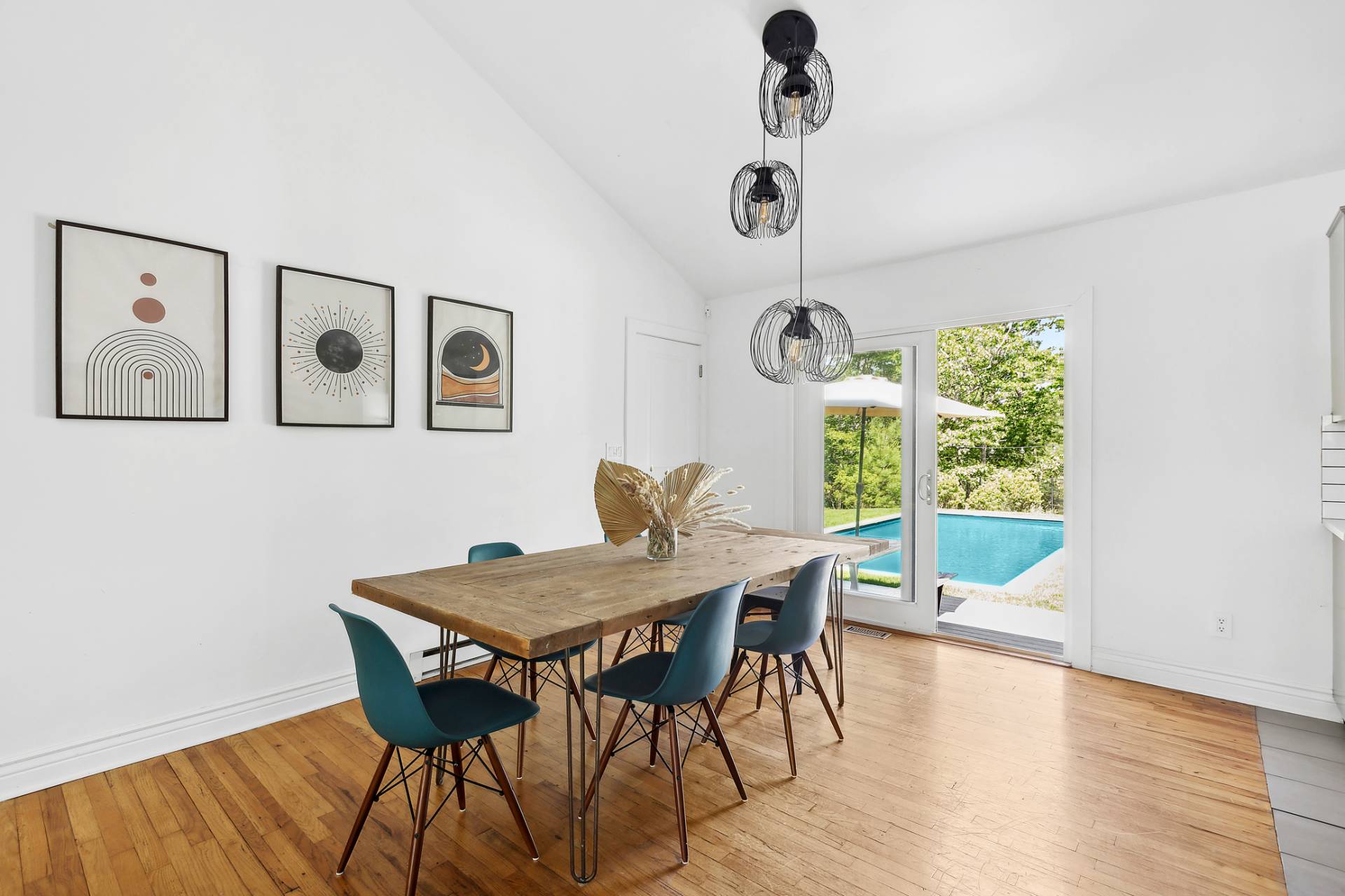 26 Whooping Hollow Road East Hampton, NY 11937 - Photo 7 of 18 a view of a dining room with furniture window and wooden floor