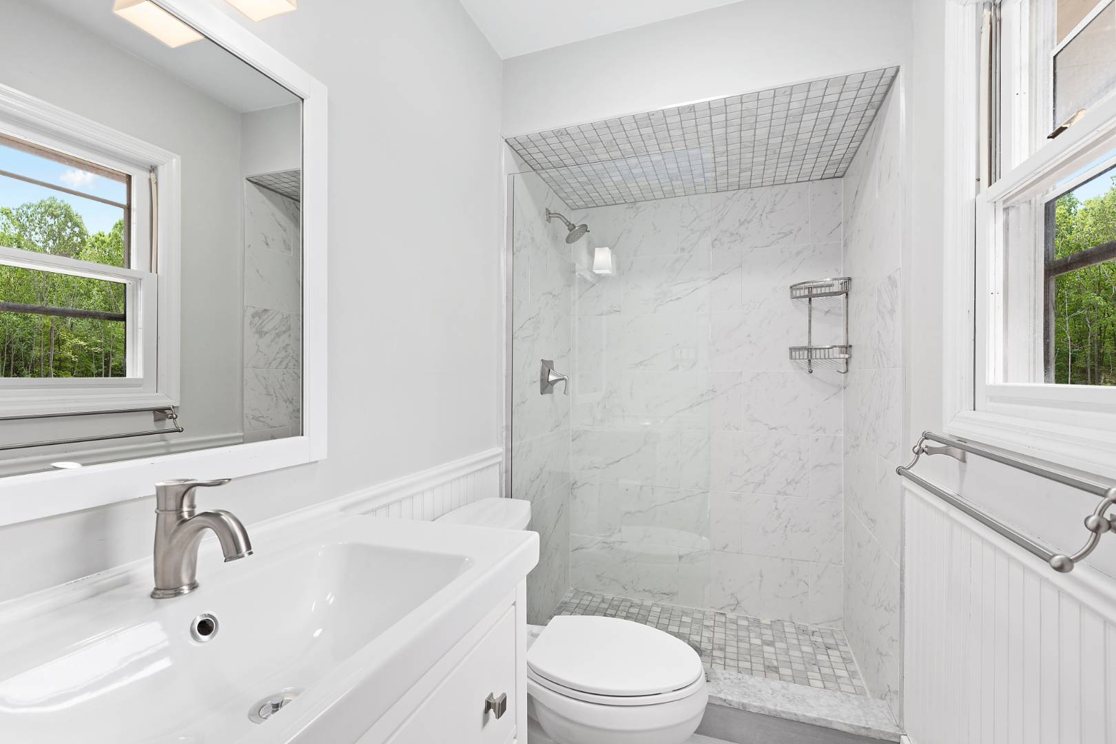 26 Whooping Hollow Road East Hampton, NY 11937 - Photo 10 of 18 a bathroom with a sink a toilet and shower