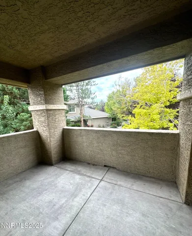a view of a building from a balcony
