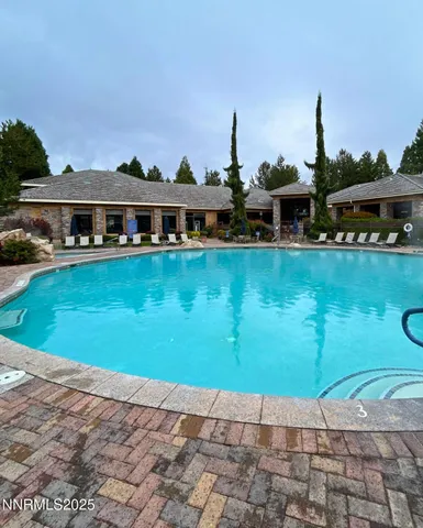a view of a swimming pool and outdoor space