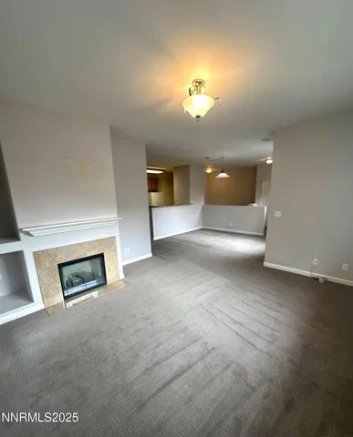 a view of a livingroom with a fireplace