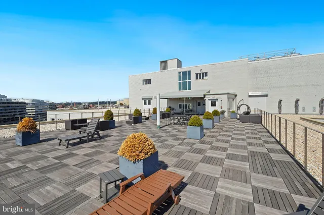 a view of a terrace with furniture