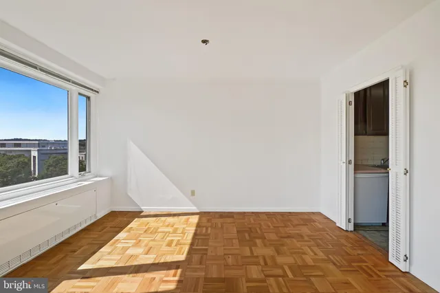 a view of an empty room and window