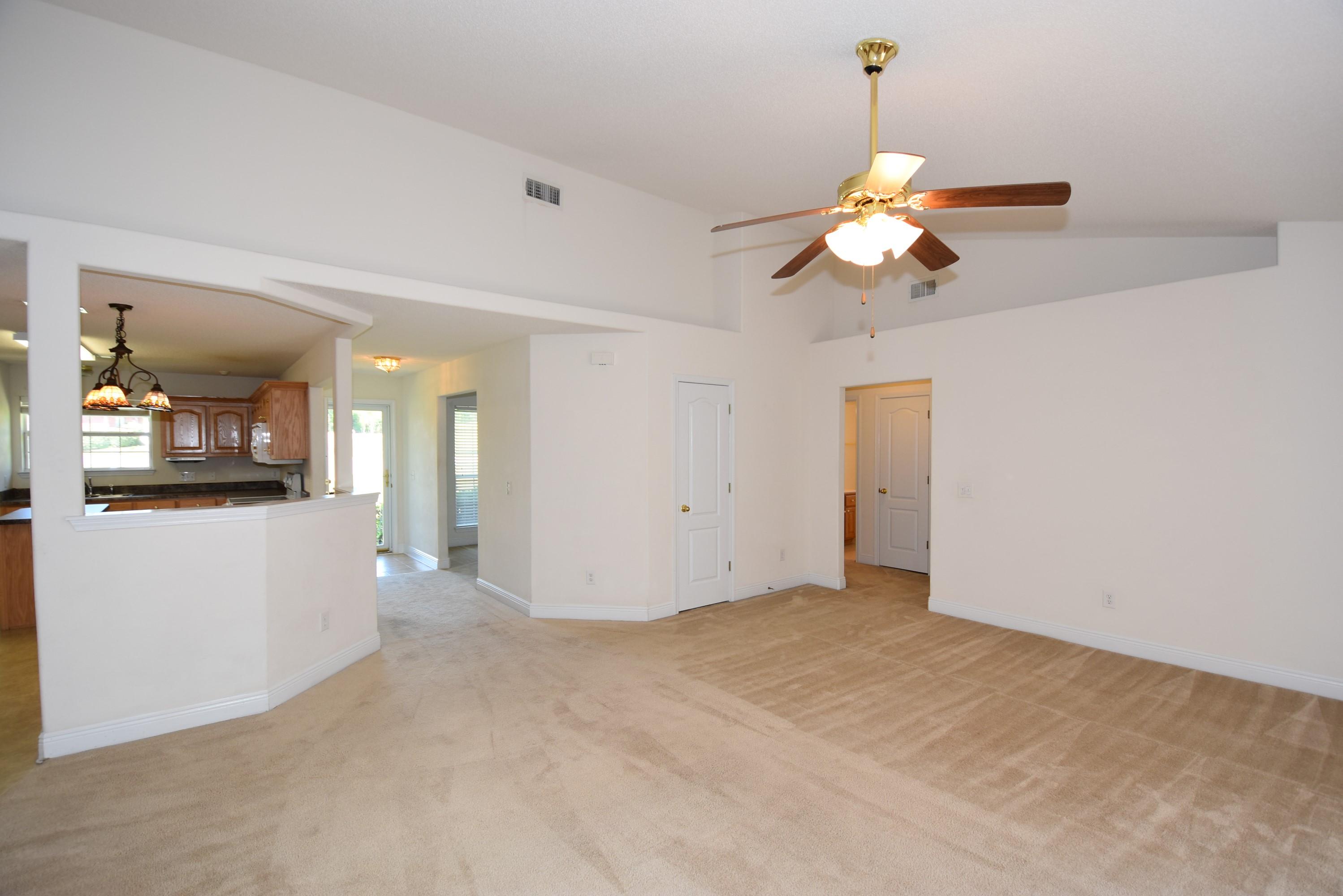 404 Swift Fox Run Crestview, FL 32536 - Photo 15 of 37 a view of an empty room with a bathroom