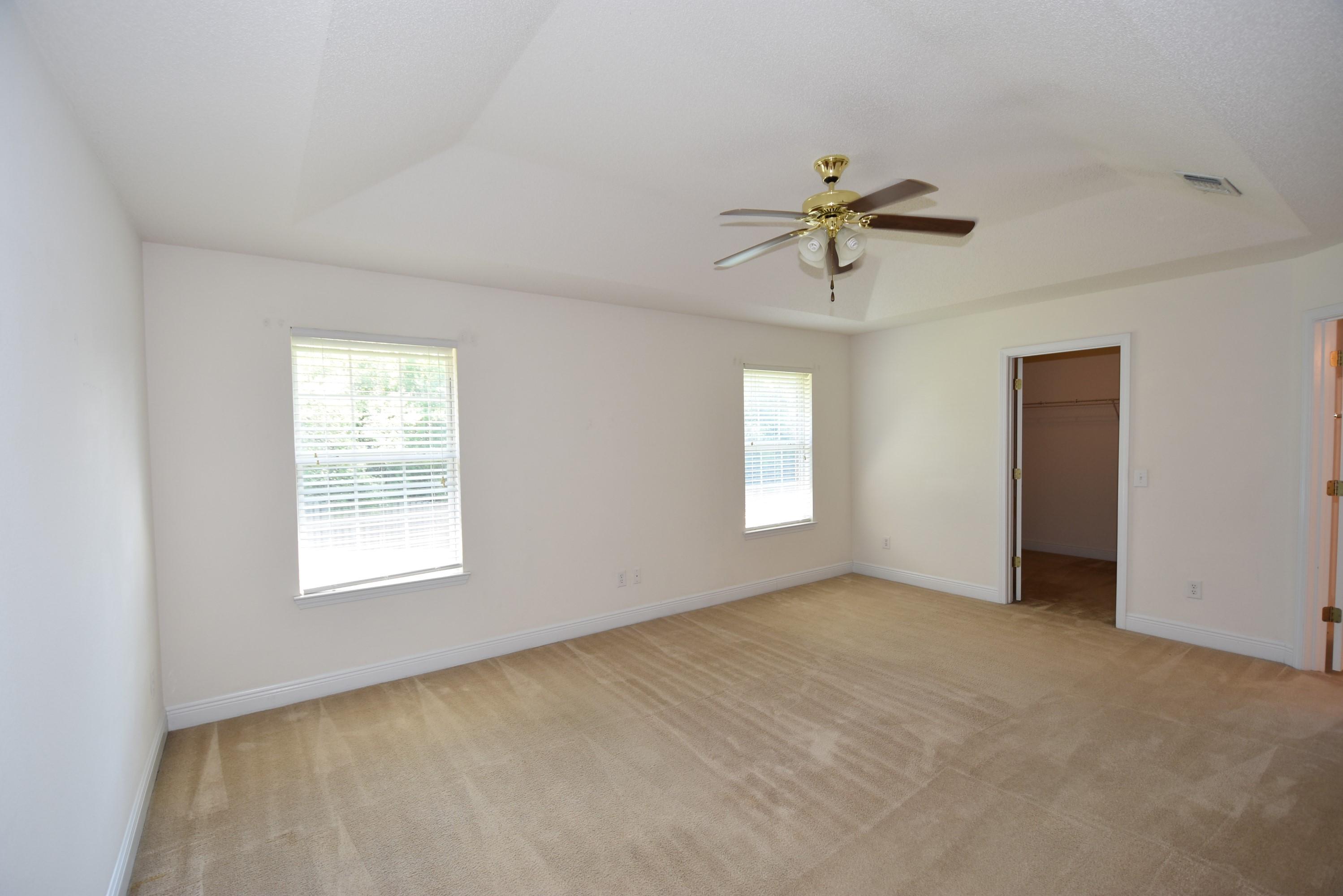 404 Swift Fox Run Crestview, FL 32536 - Photo 17 of 37 a view of an empty room with a window