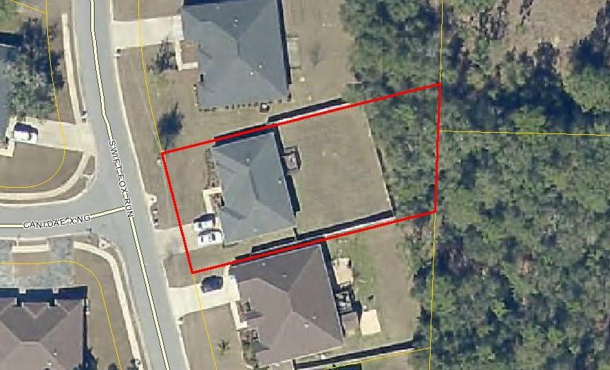 404 Swift Fox Run Crestview, FL 32536 - Photo 37 of 37 an aerial view of a highlighted house