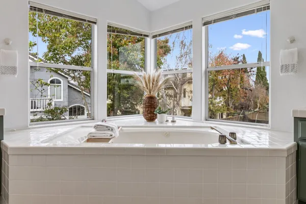 a view of a sink and a window