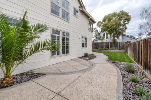 a house view with a outdoor space