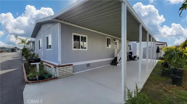 a view of a house with a patio