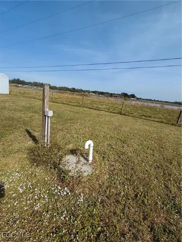 a view of a swimming pool and an outdoor space