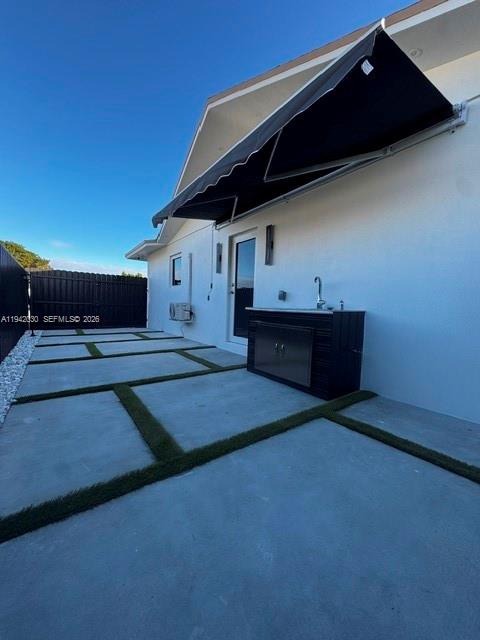 20800 Southwest 114th Court, Unit 20 Miami, FL 33189 - Photo 10 of 13 a living room with furniture
