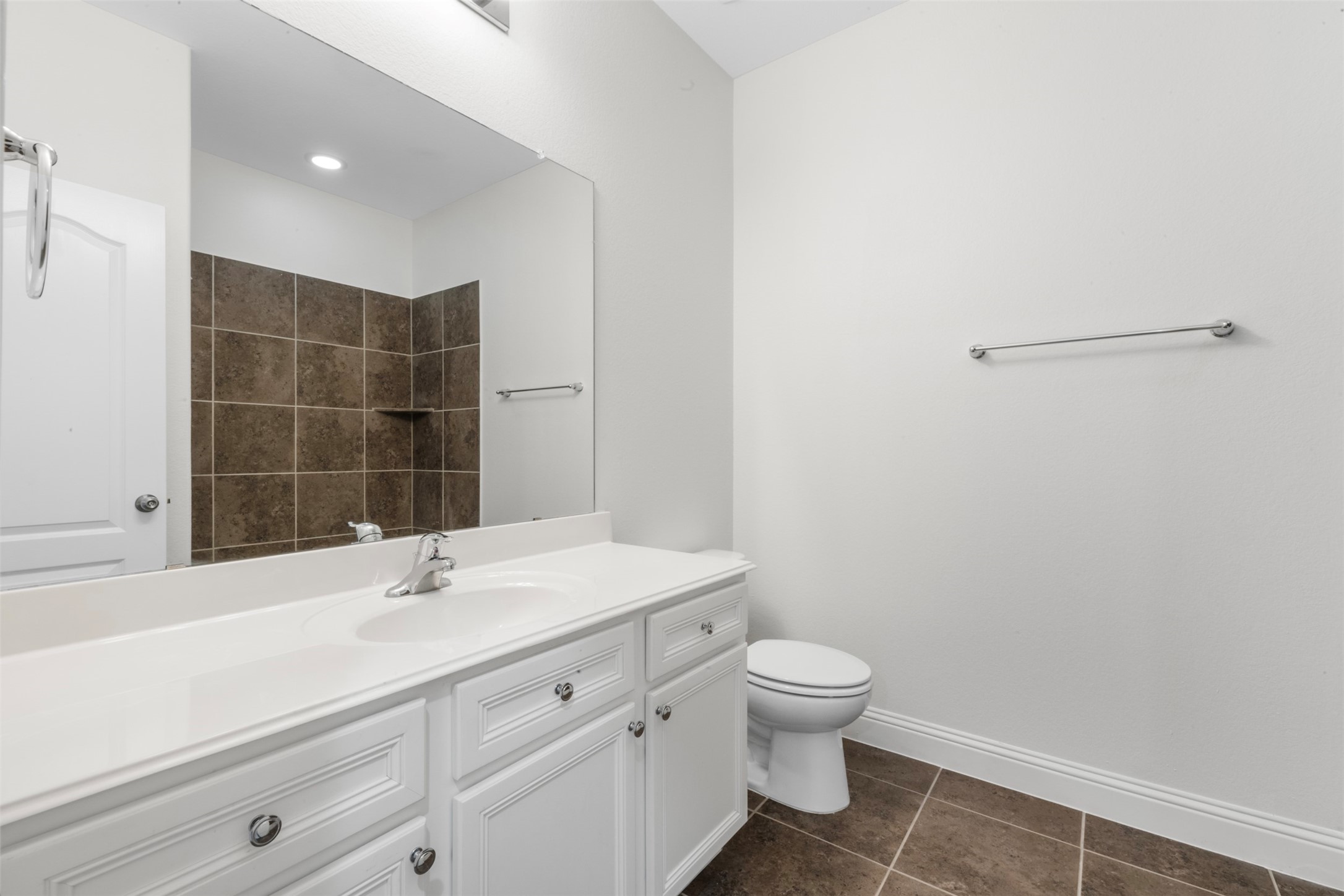 20123 Cascading Falls Boulevard Cypress, TX 77433 - Photo 29 of 41 a bathroom with a sink toilet vanity and a tub