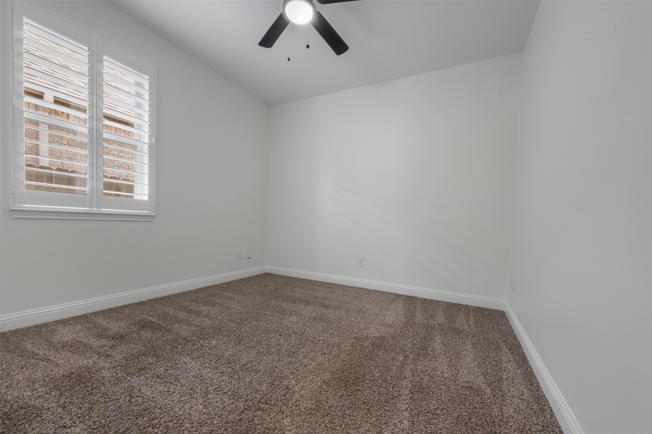 20123 Cascading Falls Boulevard Cypress, TX 77433 - Photo 32 of 41 an empty room with a window