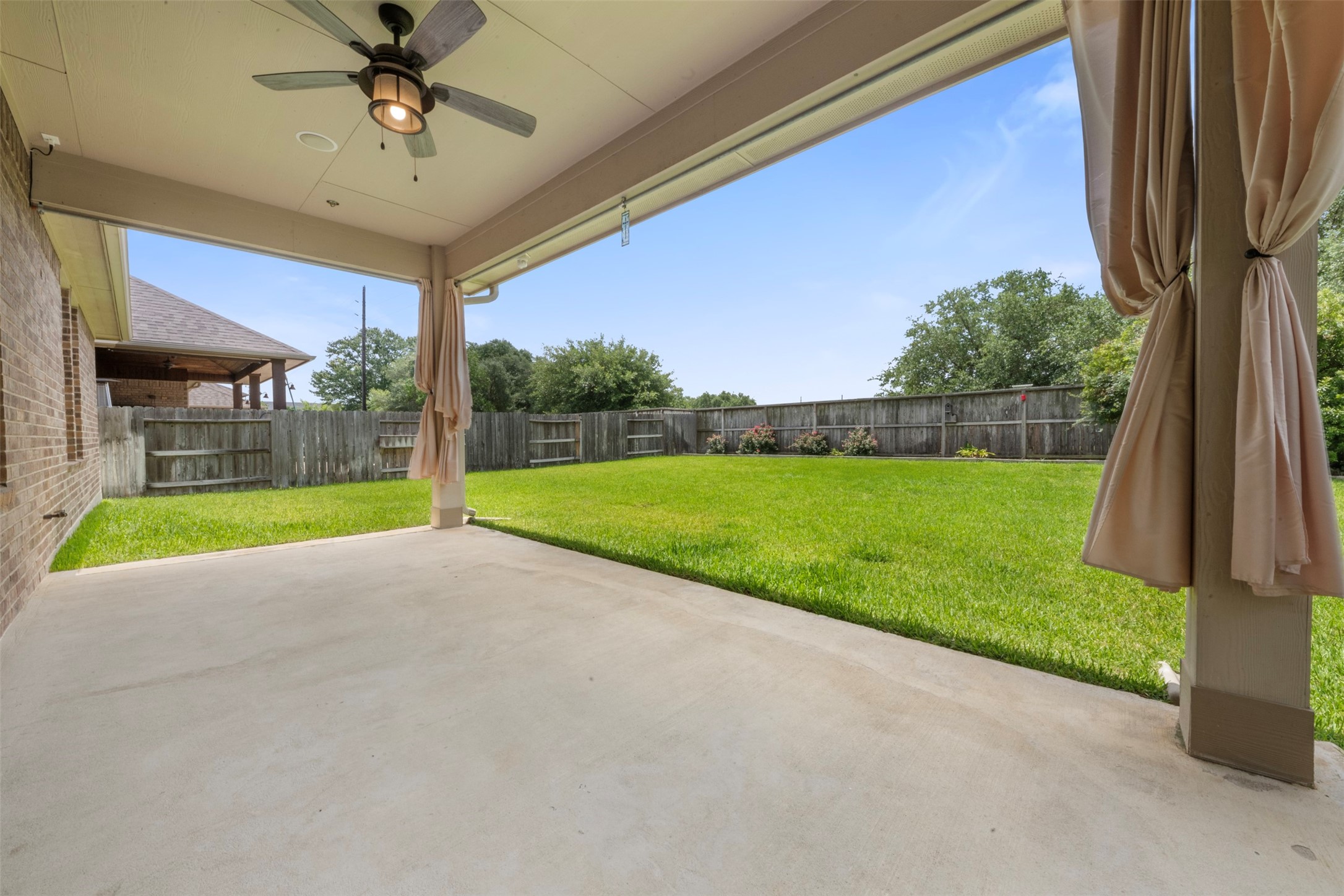 20123 Cascading Falls Boulevard Cypress, TX 77433 - Photo 35 of 41 a view of a backyard with a garden and plants