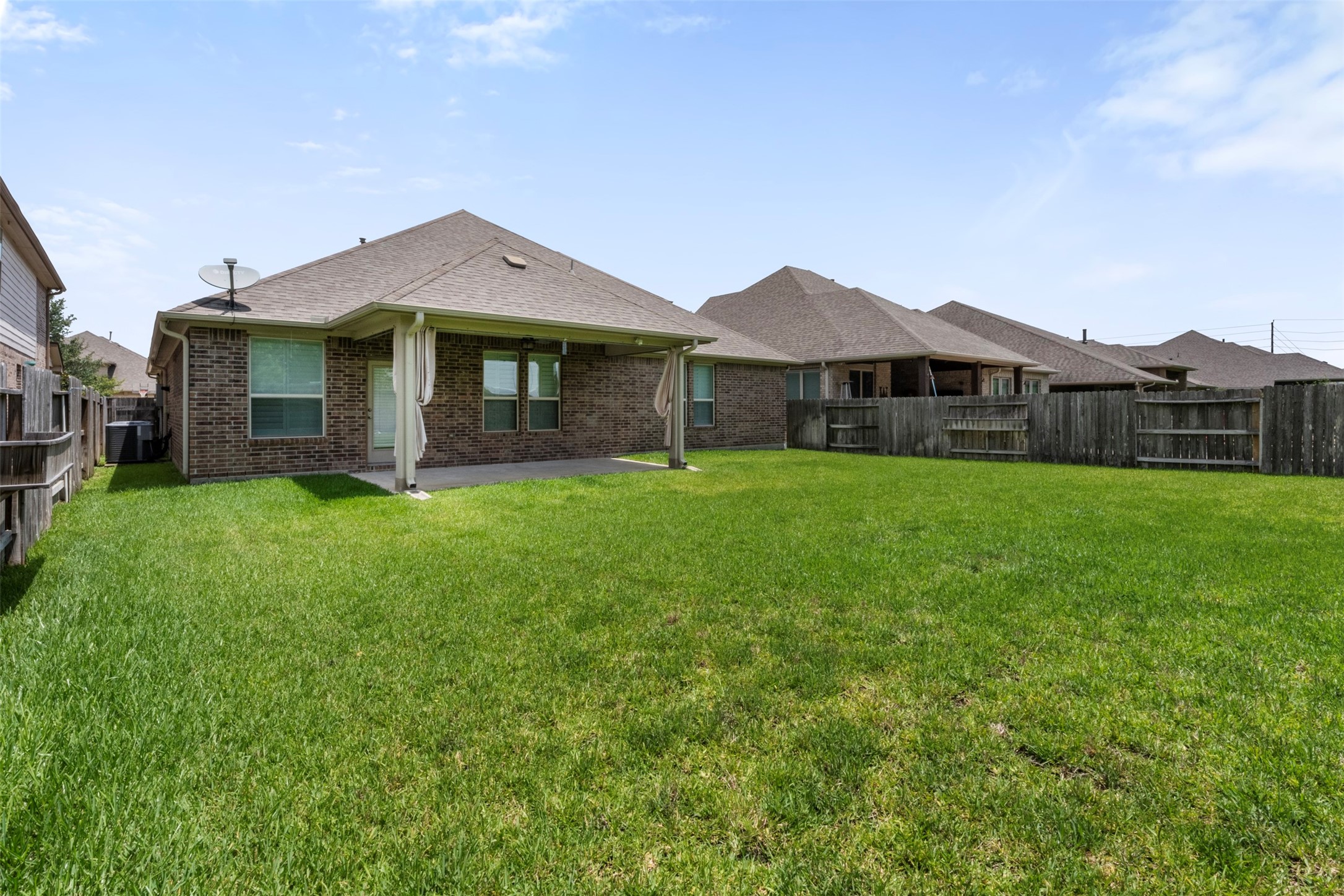 20123 Cascading Falls Boulevard Cypress, TX 77433 - Photo 40 of 41 a view of a house with a yard and sitting area