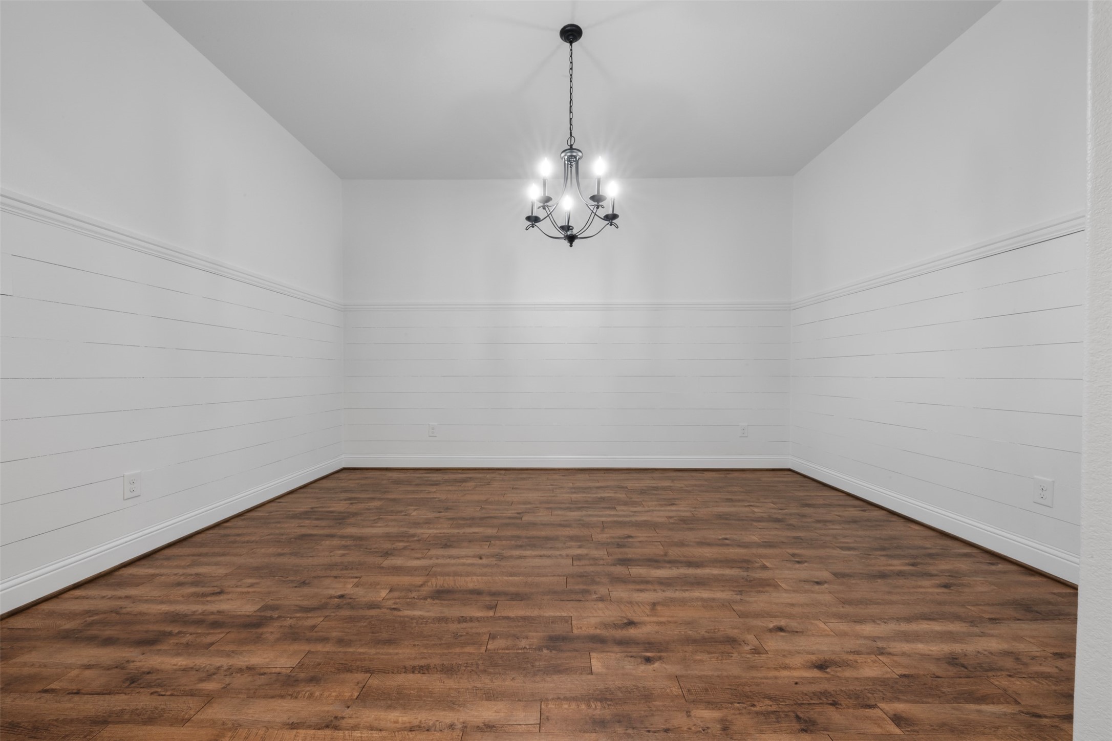 20123 Cascading Falls Boulevard Cypress, TX 77433 - Photo 6 of 41 a view of a room with a chandelier fan and wooden floor