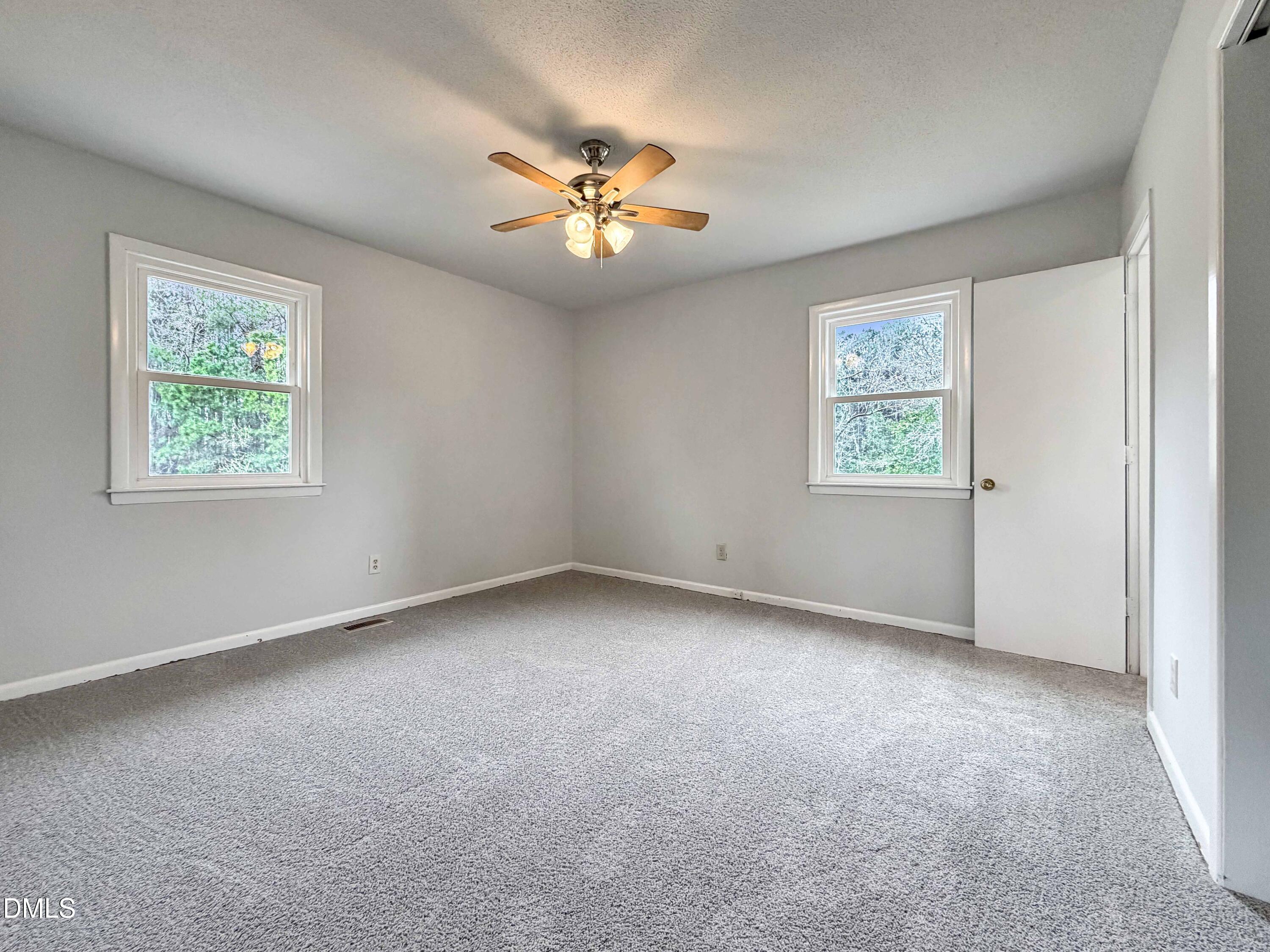 1181 McNeil Street Spring Lake, NC 28390 - Photo 13 of 18 a view of an empty room with a window