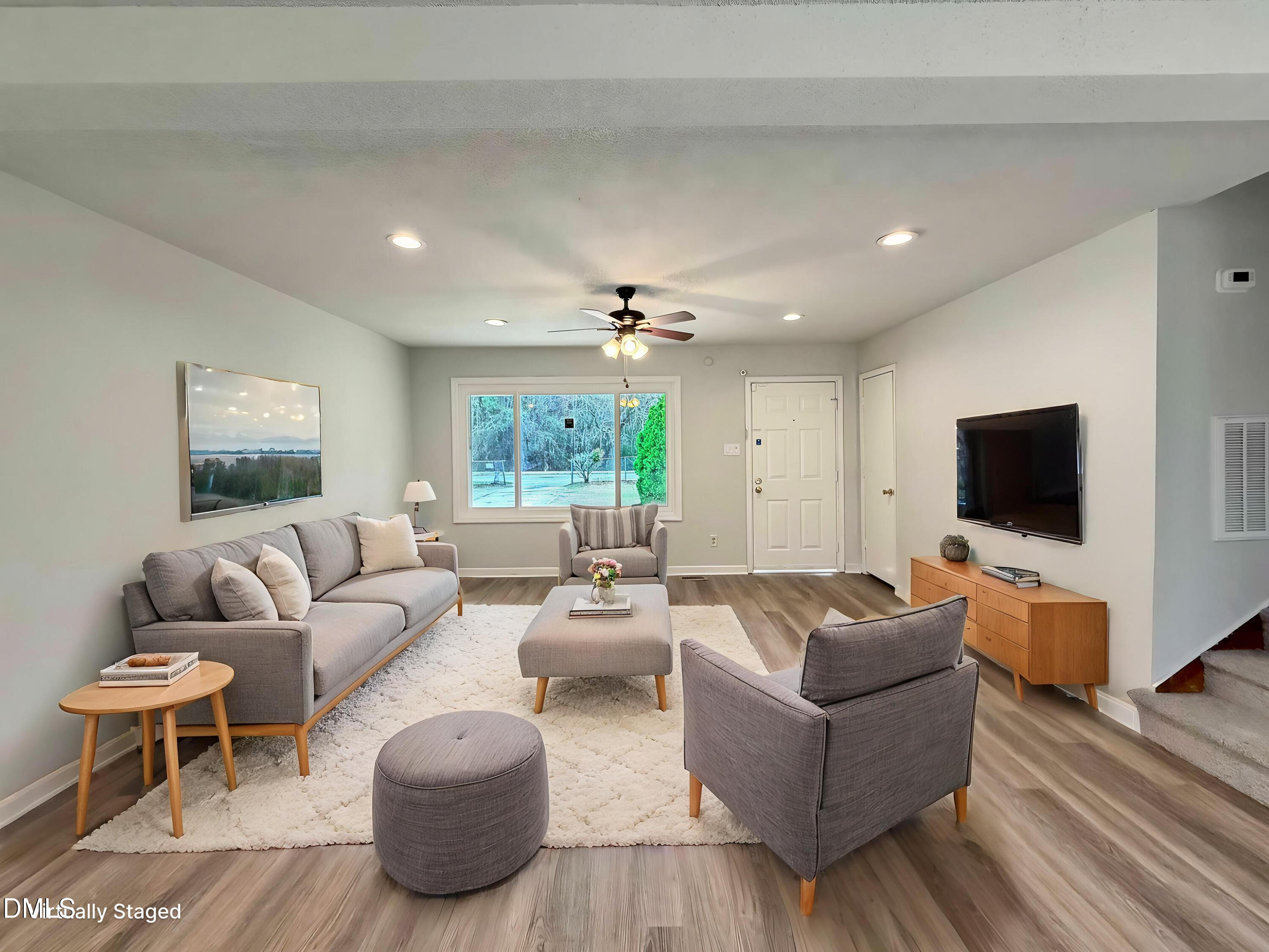 1181 McNeil Street Spring Lake, NC 28390 - Photo 2 of 18 a living room with furniture and a flat screen tv