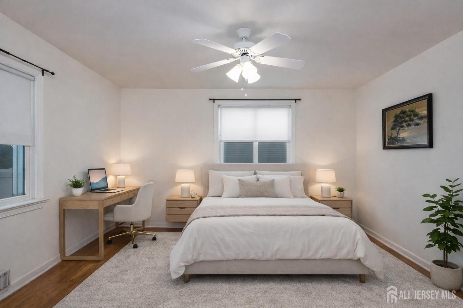 255 Harding Boulevard Matawan, NJ 07747 - Photo 5 of 19 a bedroom with a bed and a chandelier