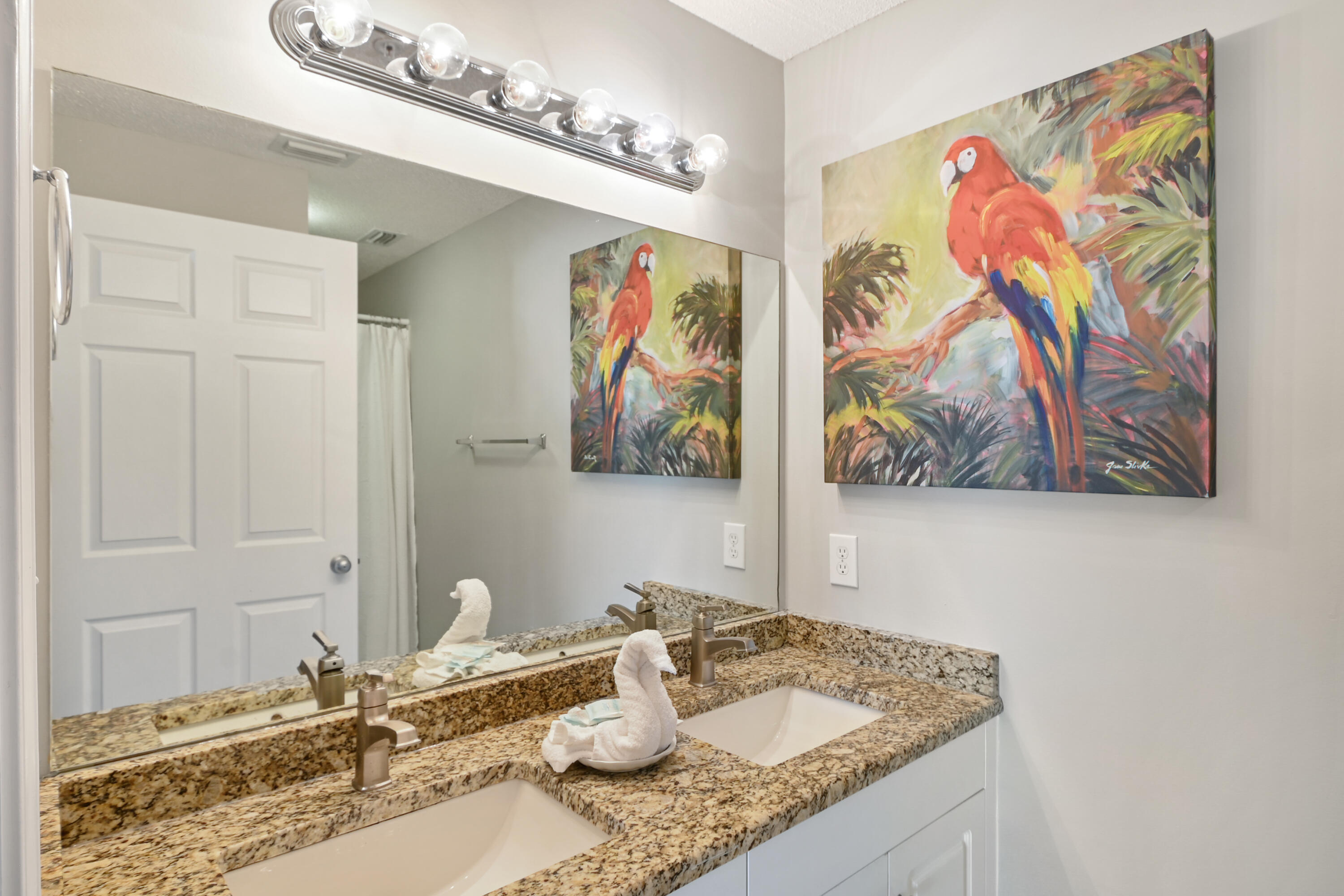 1160 Scenic Gulf Drive, Unit 612A Miramar Beach, FL 32550 - Photo 21 of 31 a bathroom with a granite countertop sink and a mirror