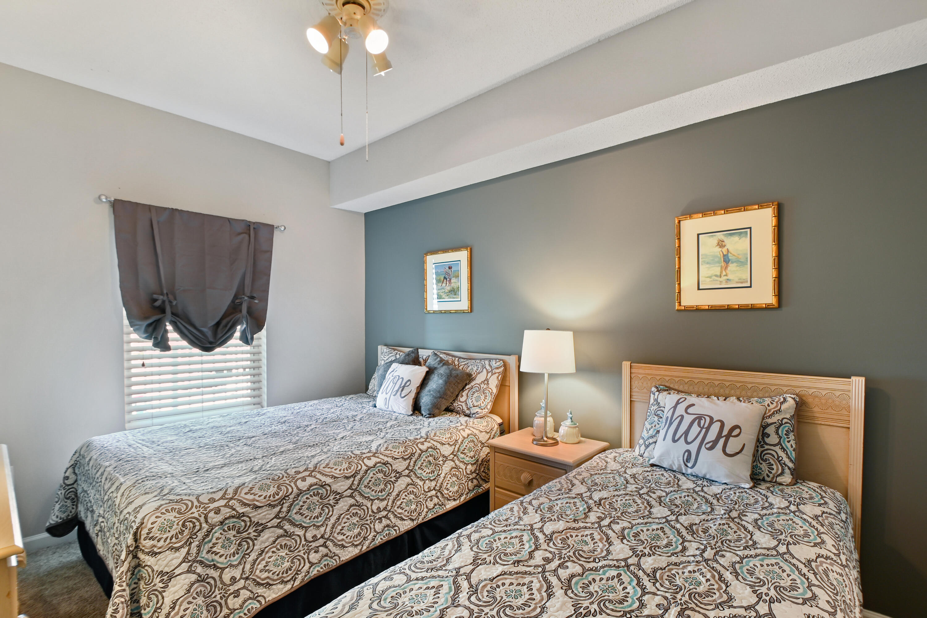 1160 Scenic Gulf Drive, Unit 612A Miramar Beach, FL 32550 - Photo 23 of 31 a bedroom with a large bed and a chandelier