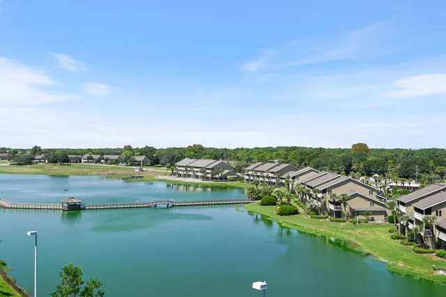 a view of lake and houses with outdoor space