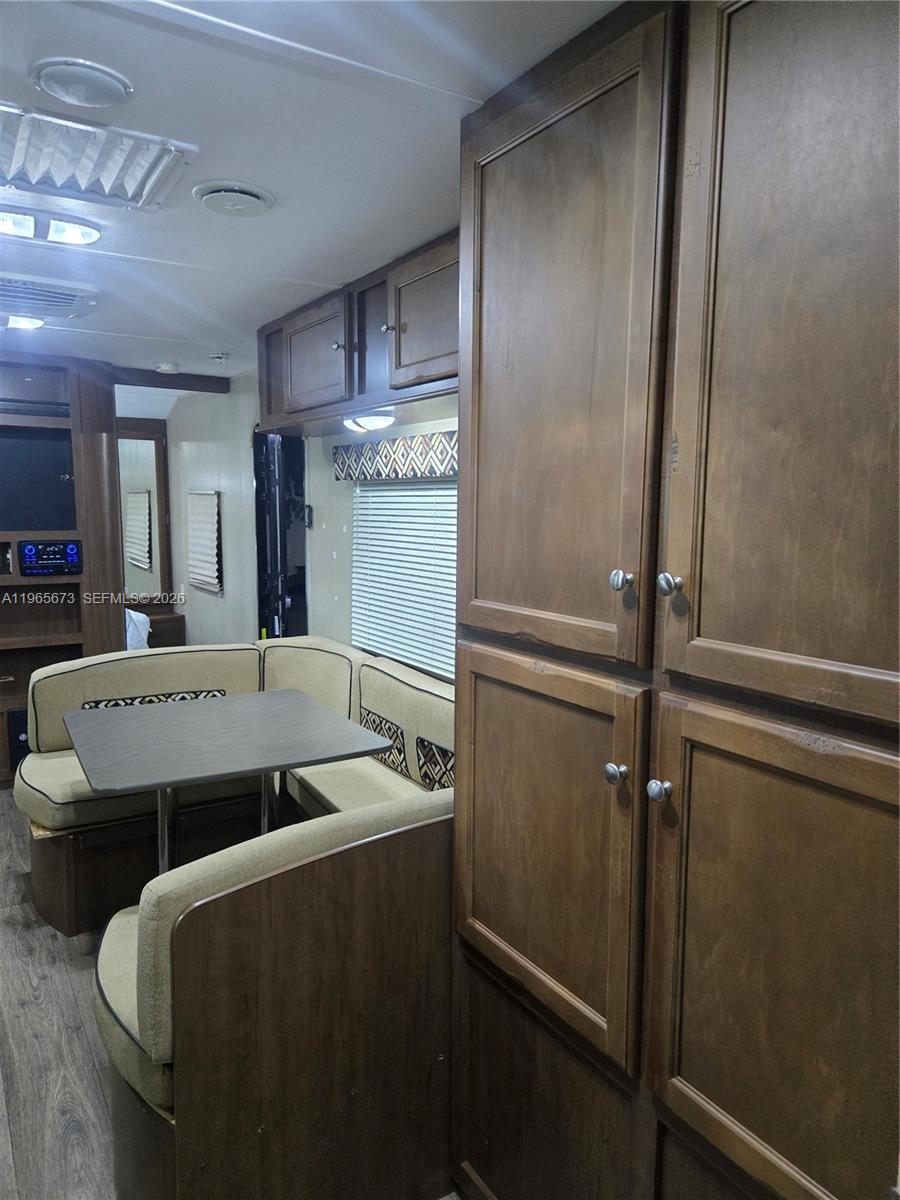 10935 Southwest 217th Terrace Miami, FL 33170 - Photo 8 of 13 a view of a room with shelves