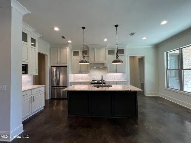 $370,000 | 731 Glenwild Drive, Canton, MS 39046