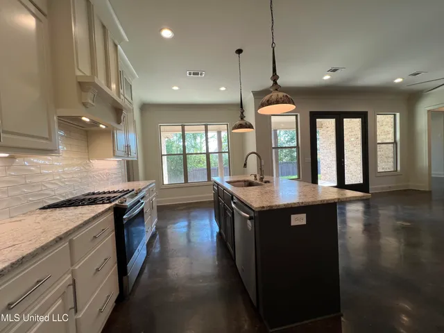 $370,000 | 731 Glenwild Drive, Canton, MS 39046