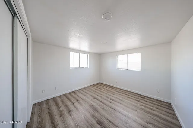 a view of room with window and closet
