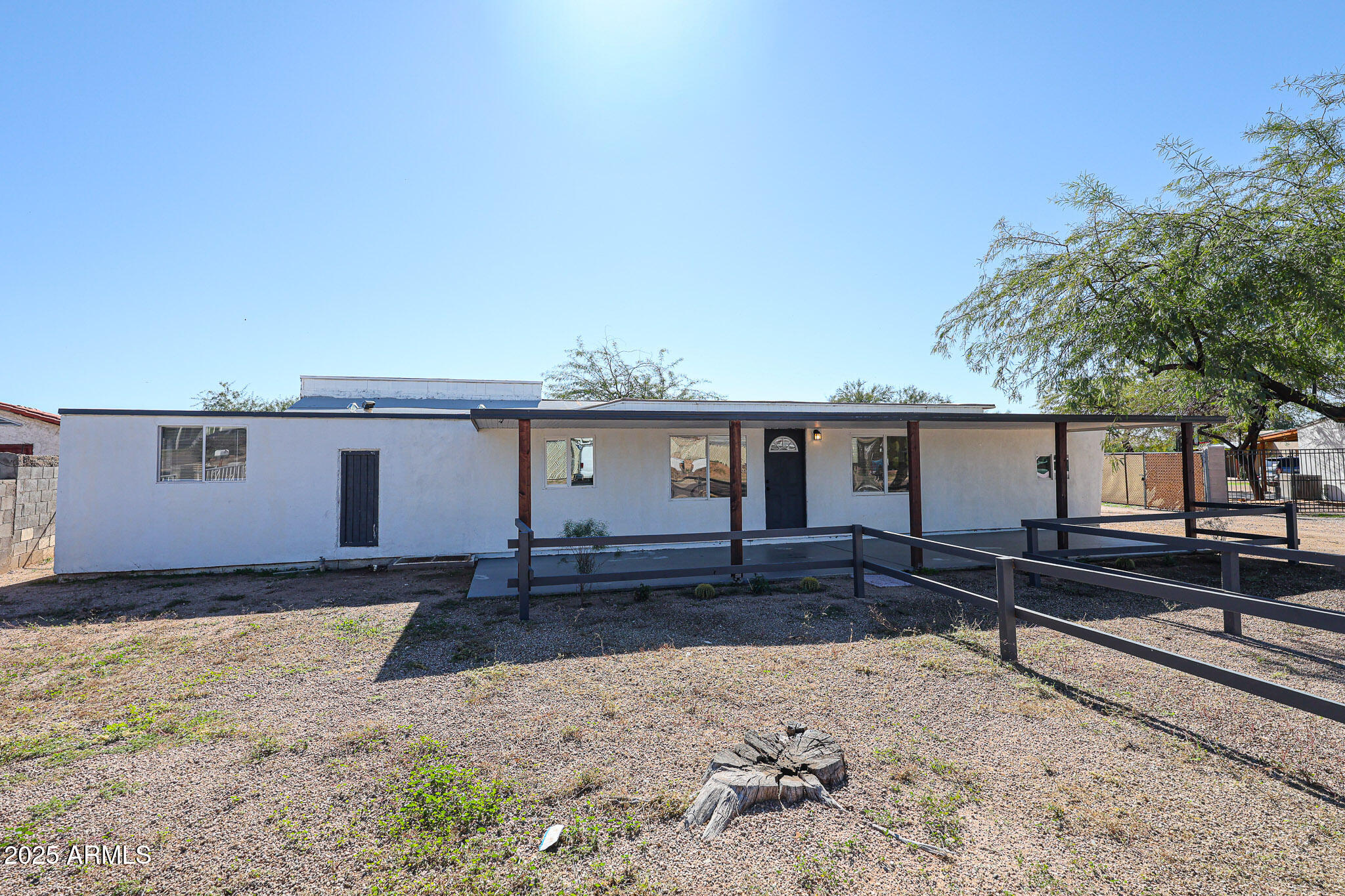 2839 East Marco Polo Road Phoenix, AZ 85050 - Photo 2 of 43 a front view of a house with a yard and garage