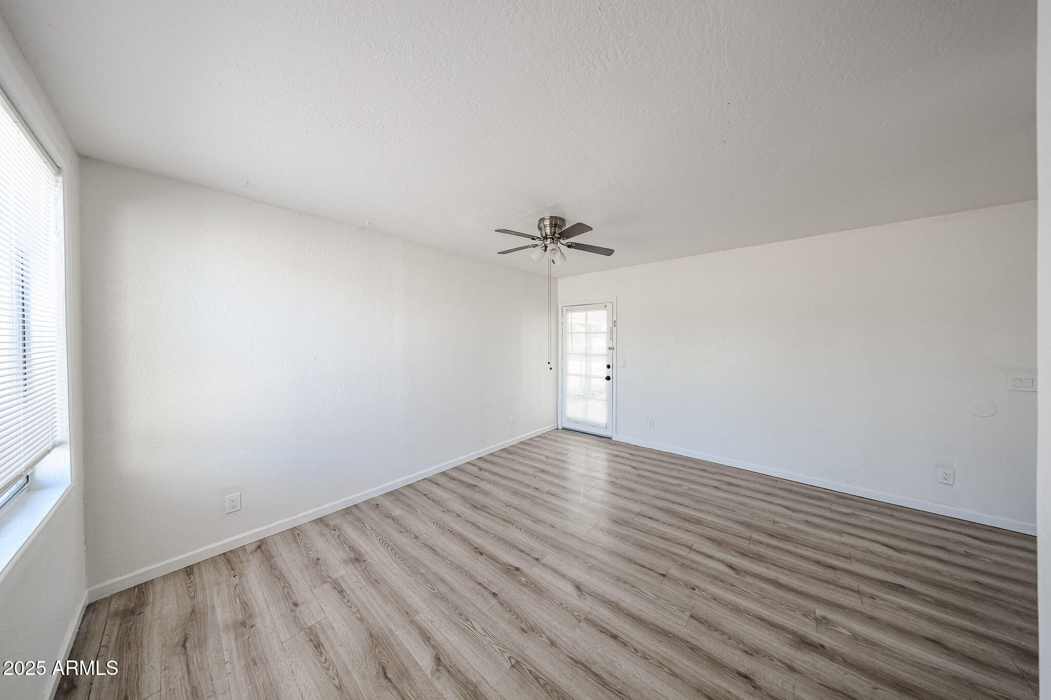 2839 East Marco Polo Road Phoenix, AZ 85050 - Photo 22 of 43 wooden floor in an empty room