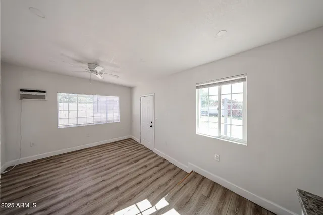 a view of a livingroom with an empty space and workspace