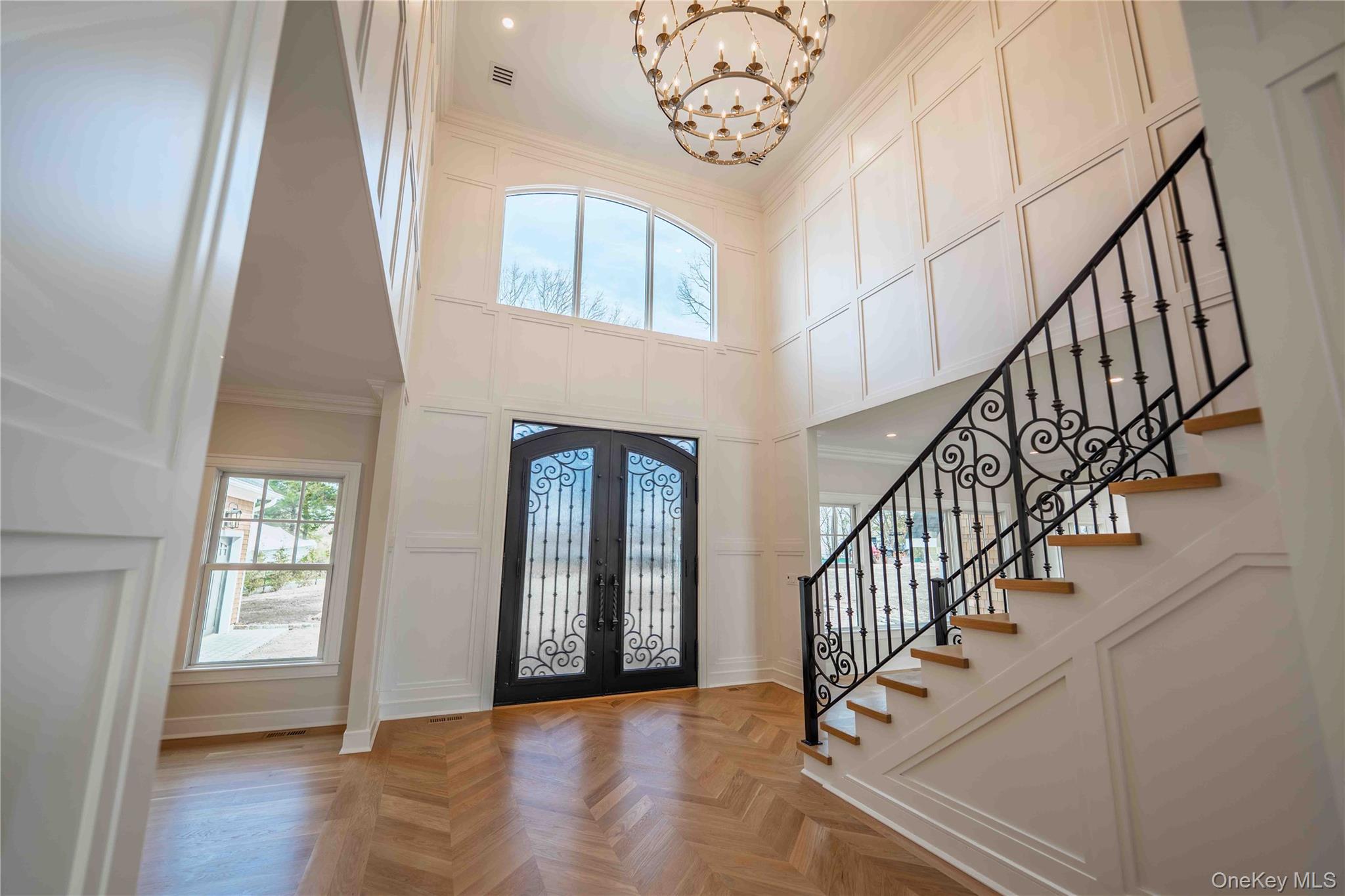 106 Cove Road Northport, NY 11768 - Photo 3 of 49 a view of entryway and hall with wooden floor
