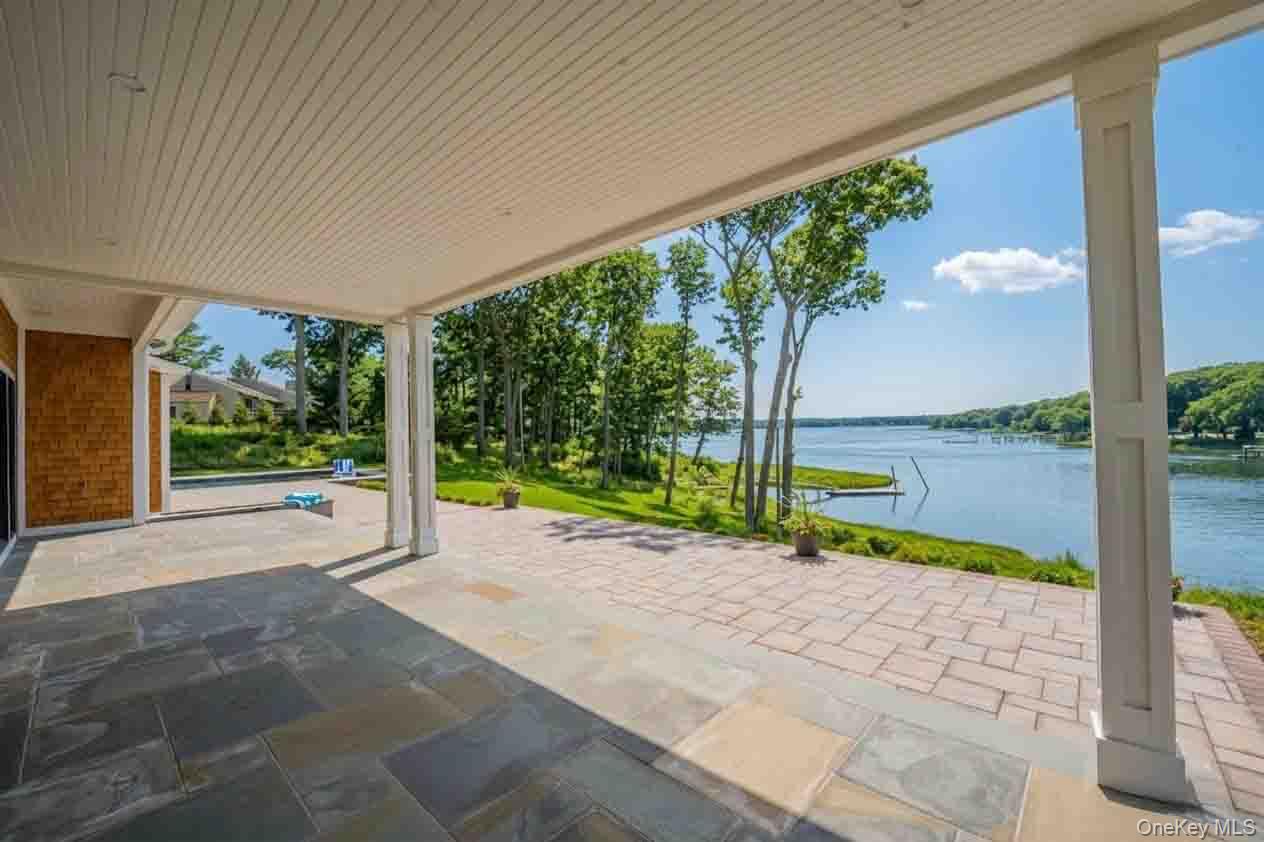106 Cove Road Northport, NY 11768 - Photo 38 of 49 a view of swimming pool with a patio