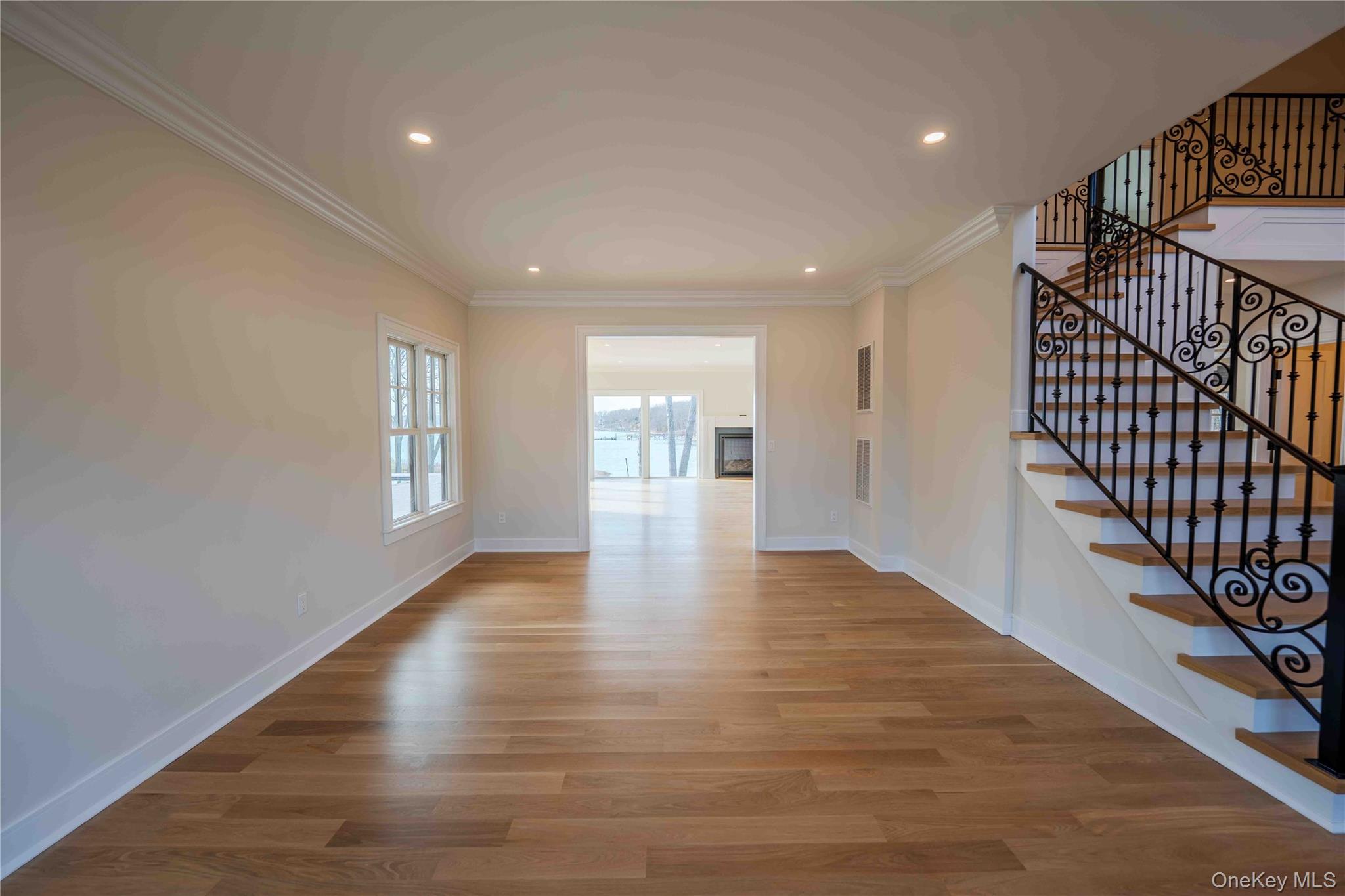 106 Cove Road Northport, NY 11768 - Photo 7 of 49 a view of an entryway with wooden floor