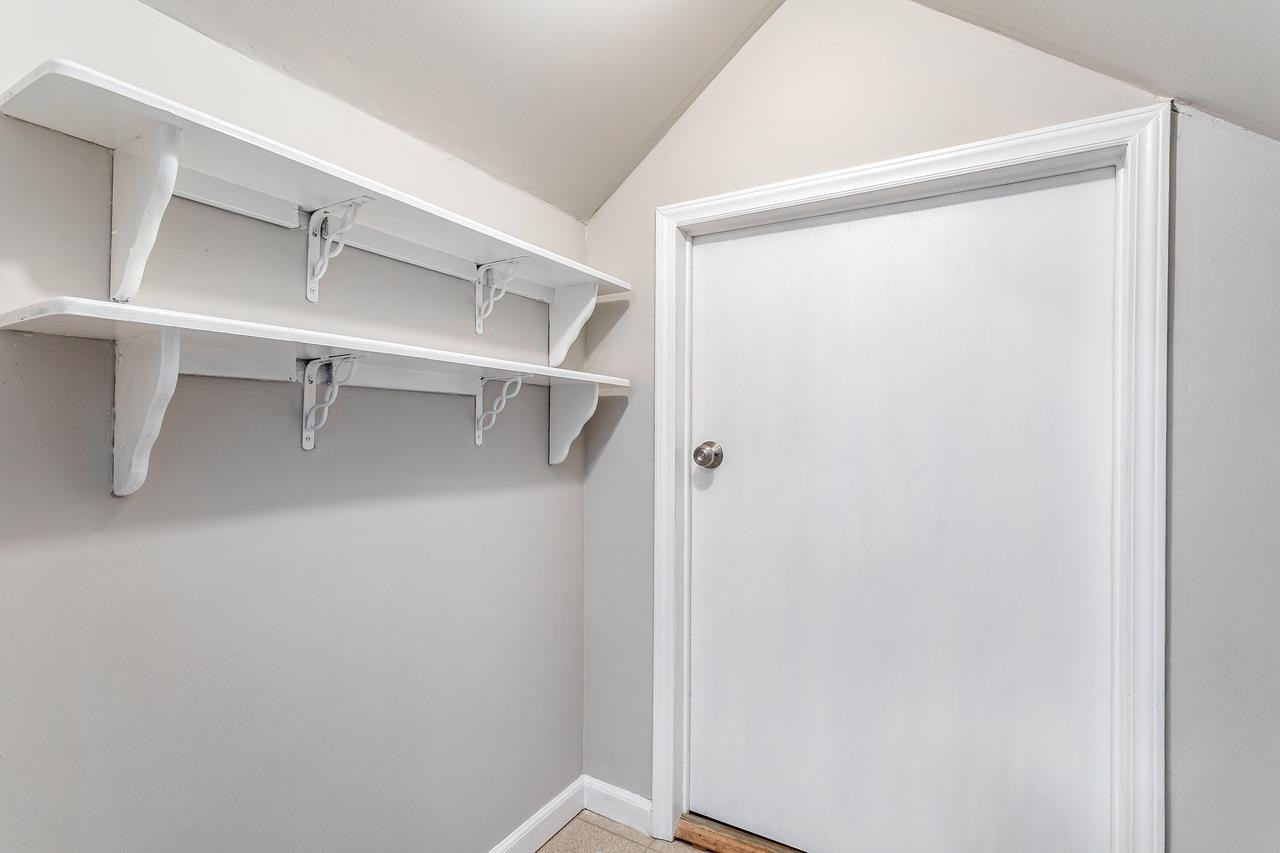 2809 Hiking Trail Raleigh, NC 27615 - Photo 23 of 28 Separate Closet off of the loft area is more like another room than a closet...be sure to check out the amazing storage space in the walk in attic through this room. Loft Closet