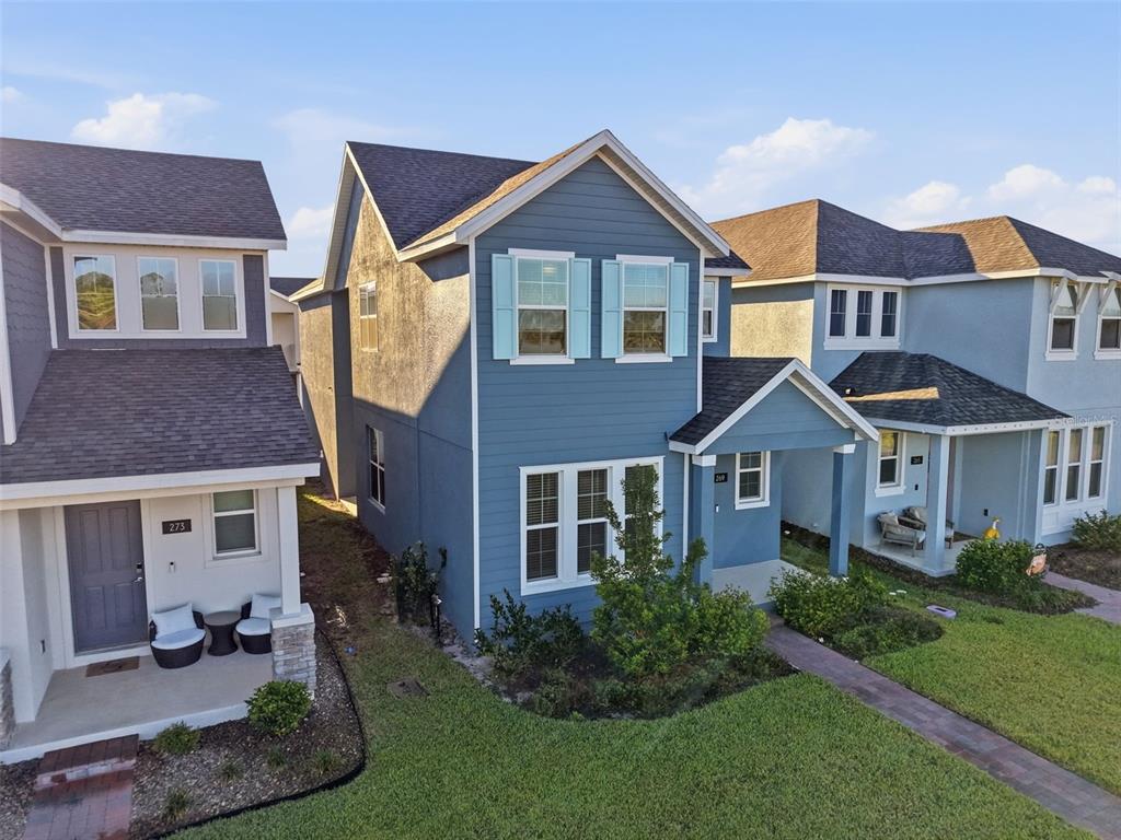 269 Platform Lane DeBary, FL 32713 - Photo 2 of 41 a front view of a house with a yard and porch