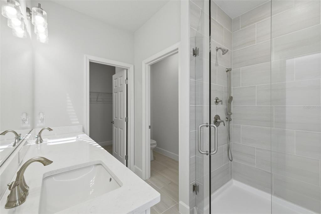 269 Platform Lane DeBary, FL 32713 - Photo 25 of 41 a bathroom with a sink and shower