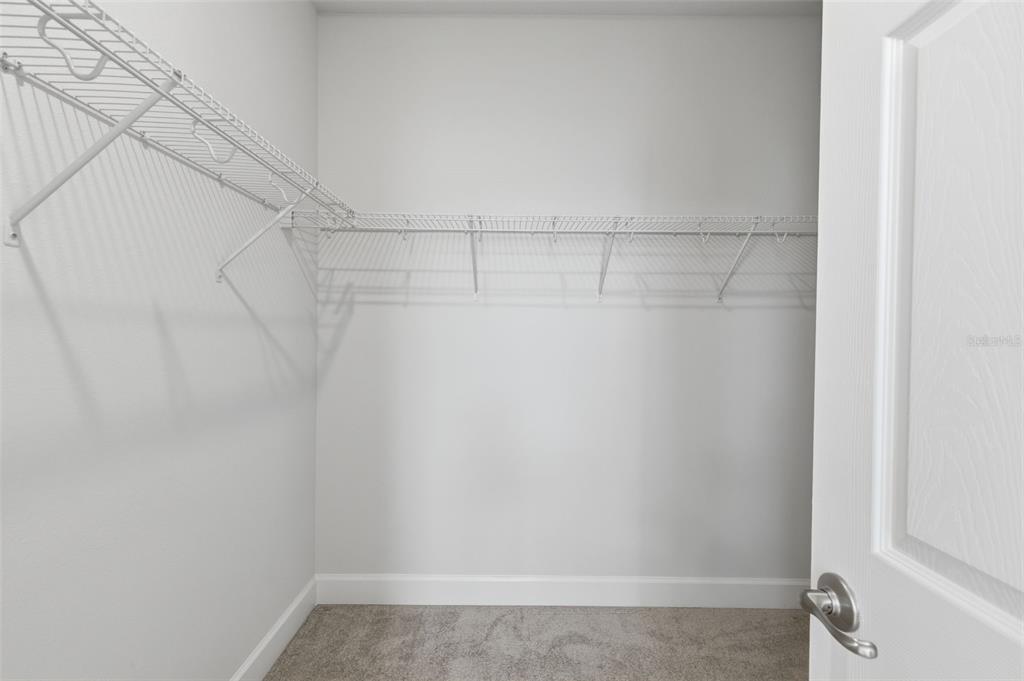 269 Platform Lane DeBary, FL 32713 - Photo 27 of 41 a view of a room with racks on the wall