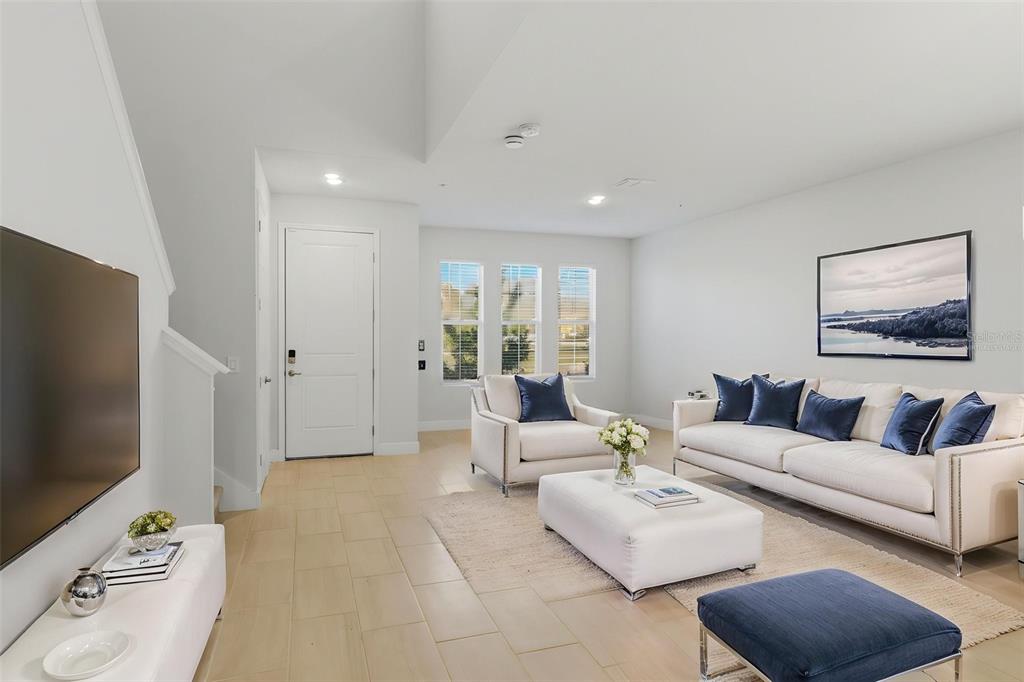 269 Platform Lane DeBary, FL 32713 - Photo 3 of 41 a living room with furniture and a flat screen tv