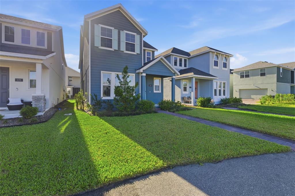 269 Platform Lane DeBary, FL 32713 - Photo 34 of 41 a front view of a house with a yard
