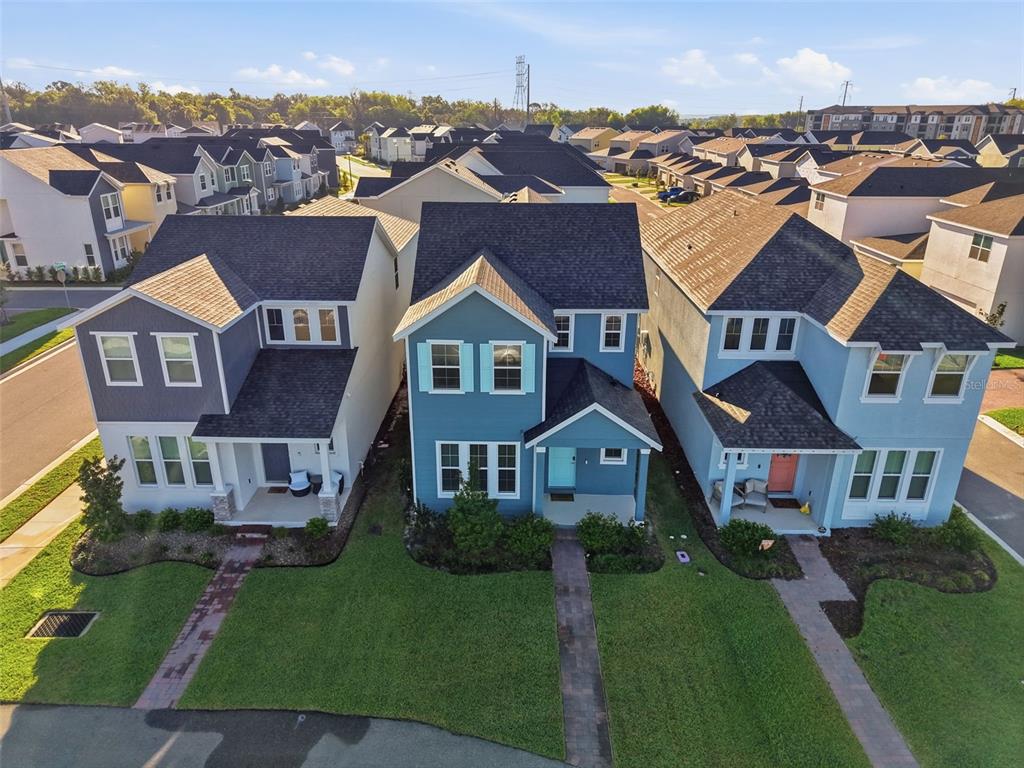 269 Platform Lane DeBary, FL 32713 - Photo 36 of 41 an aerial view of a residential apartment building with a yard