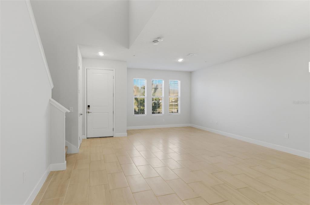 269 Platform Lane DeBary, FL 32713 - Photo 4 of 41 an empty room with windows