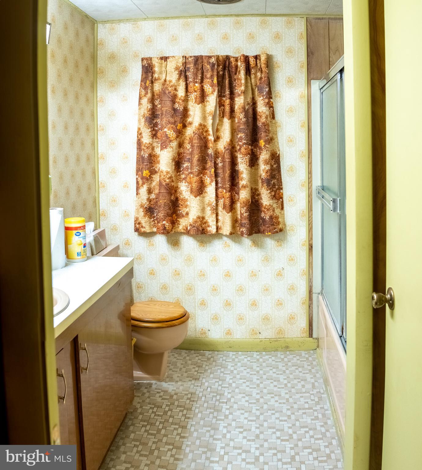 165 Fairground Road Prince Frederick, MD 20678 - Photo 11 of 27 a bathroom with a granite countertop bathtub and a shower