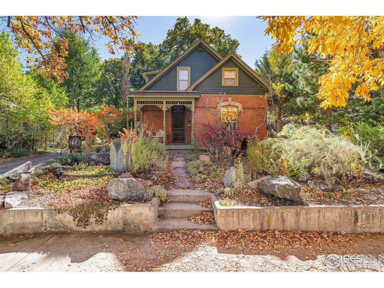 636 Marine Street Boulder, CO 80302 - Photo 1 of 46 a front view of a house with garden