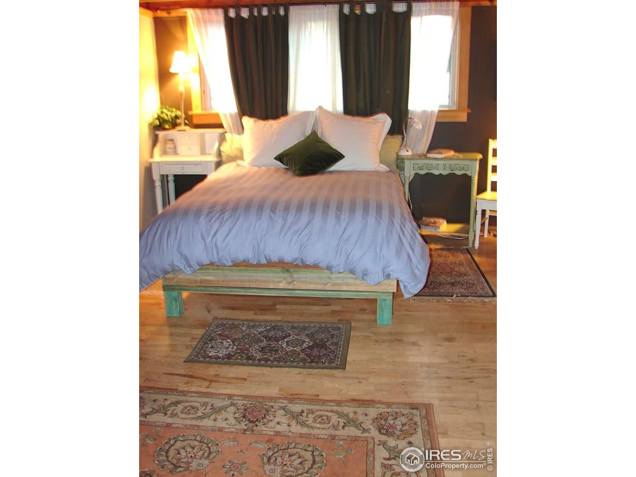 636 Marine Street Boulder, CO 80302 - Photo 24 of 46 a bedroom with a bed and a window