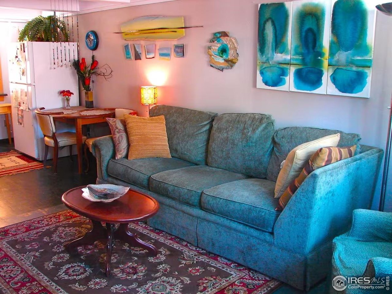 636 Marine Street Boulder, CO 80302 - Photo 29 of 46 a living room with furniture a rug and a lamp