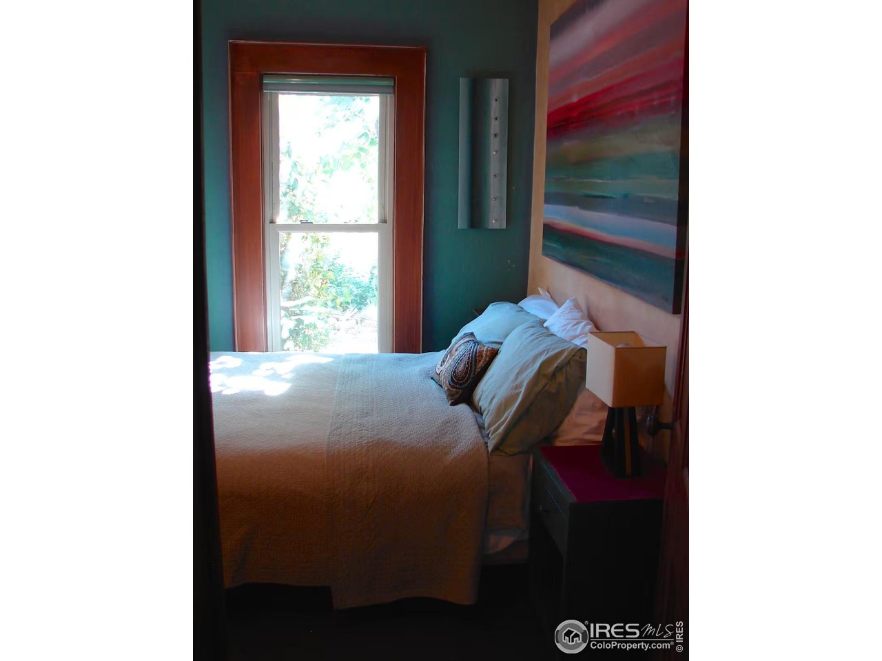 636 Marine Street Boulder, CO 80302 - Photo 30 of 46 a bedroom with a bed and a window